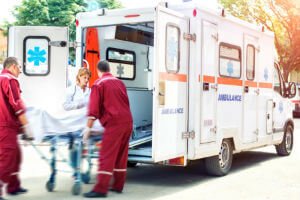 loading accident victim into ambulance