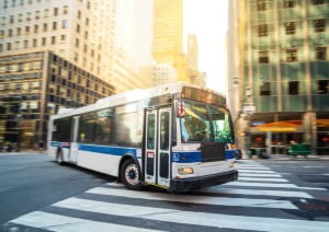 city bus turning into intersection