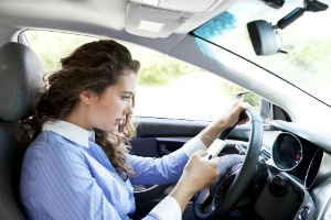 driver looking at cellphone