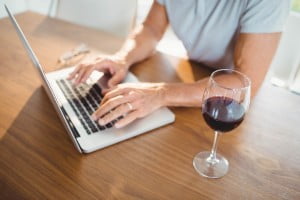 drinking and working at the computer