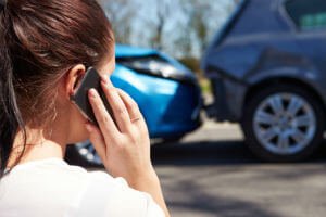 girl looking at accident