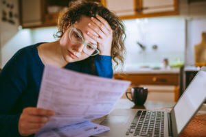 girl looking at papers