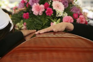 mourning over coffin