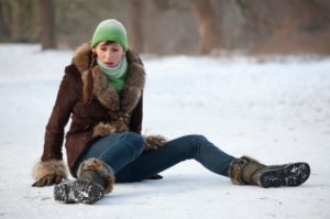 person in the ground in snow
