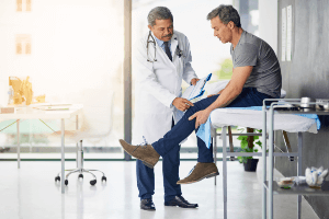 doctor inspecting a patient
