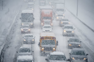 cars driving in snow