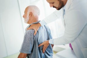 injured patient with doctor