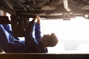 mechanic repairing car