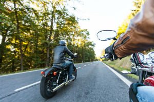 motorcycles riding on a highway