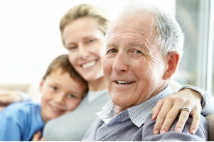 elderly man with family