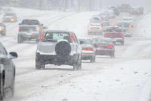 cars traveling in snow