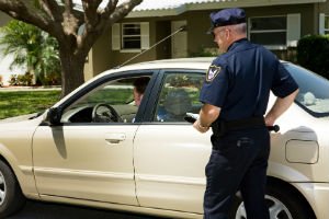 police officer approaching vehicle