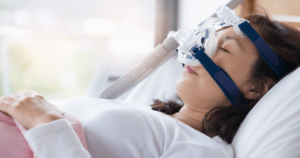 woman using a CPAP machine