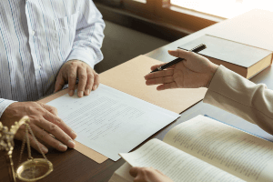 a client and an attorney discussing a document