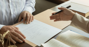 a client and an attorney discussing a document