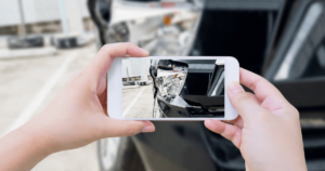 taking pictures of damaged car