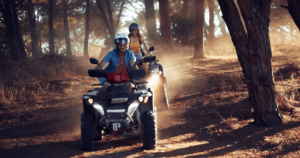 driving ATVs in woods