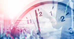 clock imposed over people shaking hands