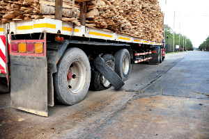 blown out tire on a lumber truck