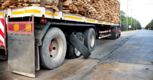 blown out tire on a lumber truck