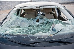 shattered windshield on car after accident