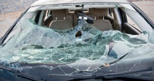 shattered windshield on car after accident