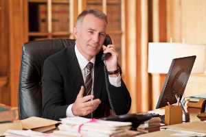 man in suit on the phone