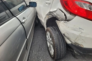 A car crashing into another vehicle from the side.