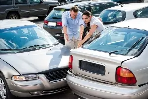 two drivers arguing after a rear-end crash