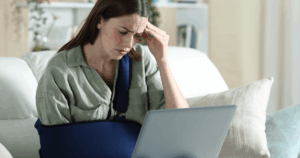 young woman with arm in sling