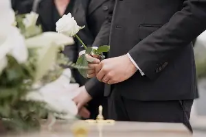 people at burial site